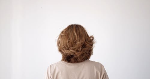 A Woman Showing Her Blond Hair