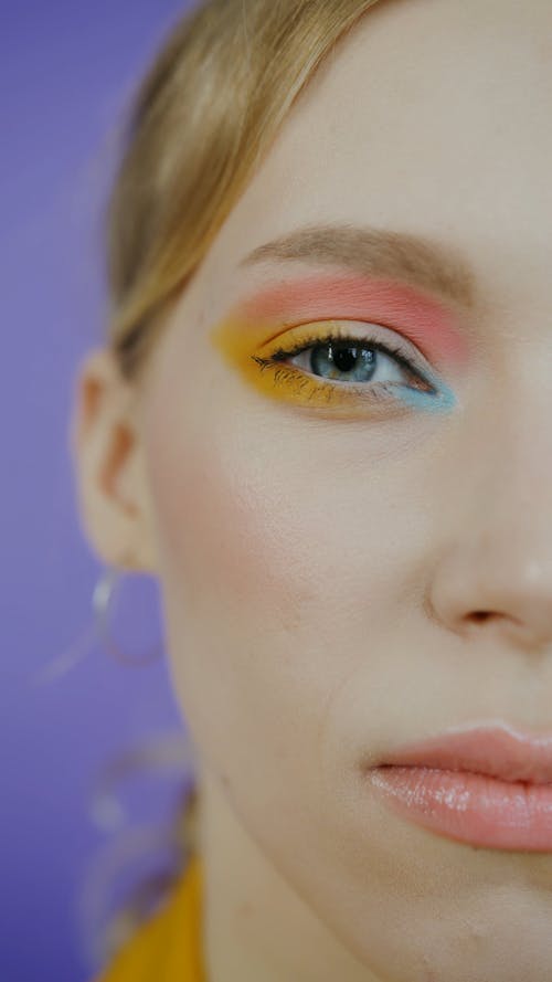 Half Face Of Woman Wearing Makeup