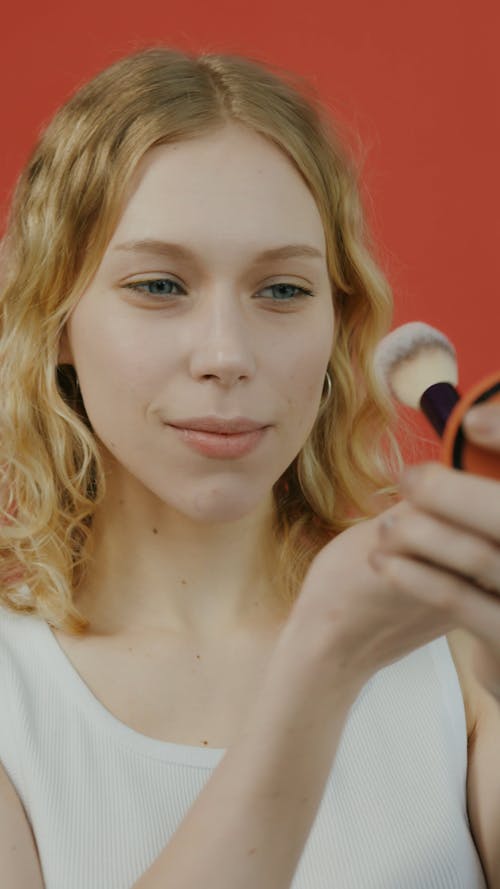 Woman Putting on Make-up