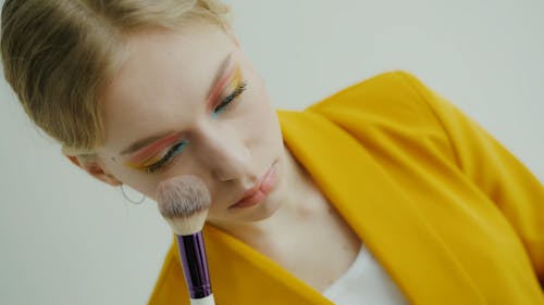 Young Woman Applying Makeup