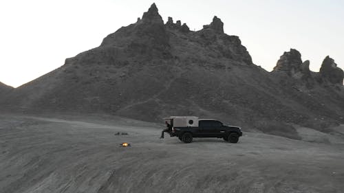Person in a Car in the Middle of the Desert 