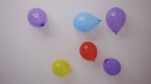 Colorful Balloons Sticking on the Wall