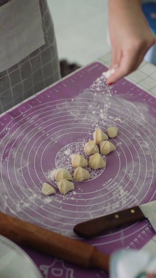 Person Making Dumplings