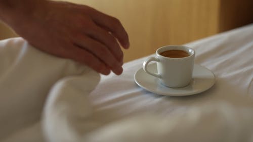 A Person Getting a Cup of Coffee