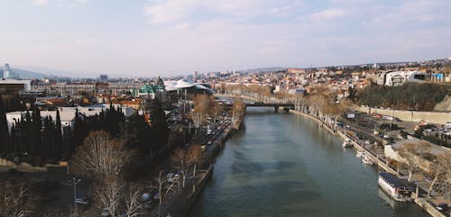 Drone Footage of a River in a City