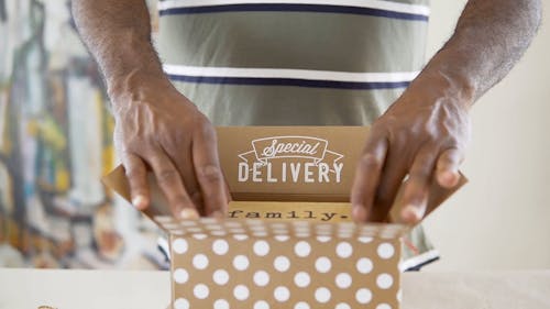 A Business Person Preparing a Package