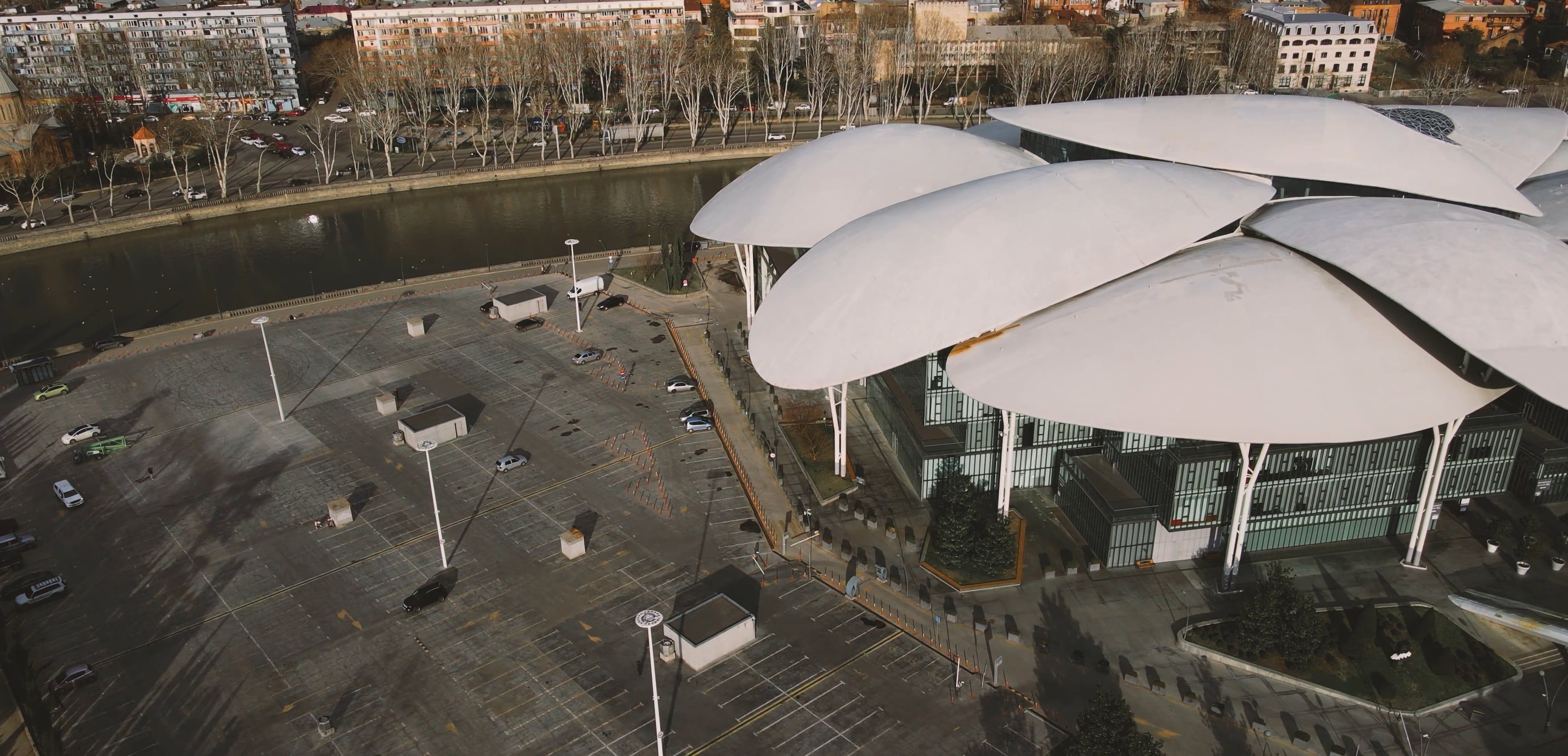 Drone Footage of a Modern Architectural Building · Free Stock Video