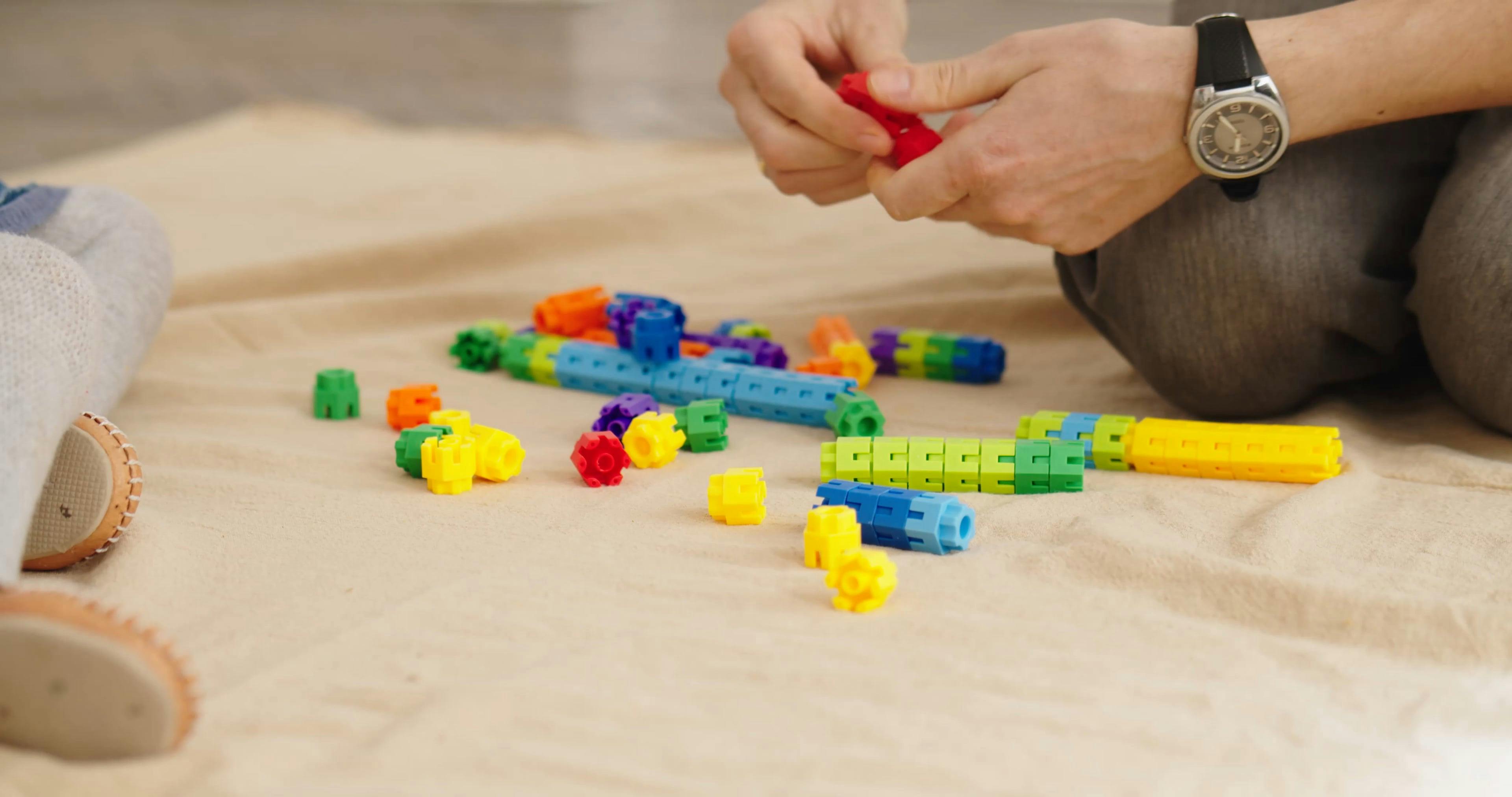 Child Playing with Interlocking Toys · Free Stock Video