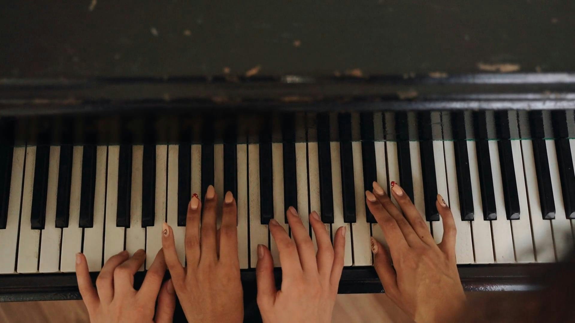 Close up Shot of Two Hands Playing the Piano · Free Stock Video