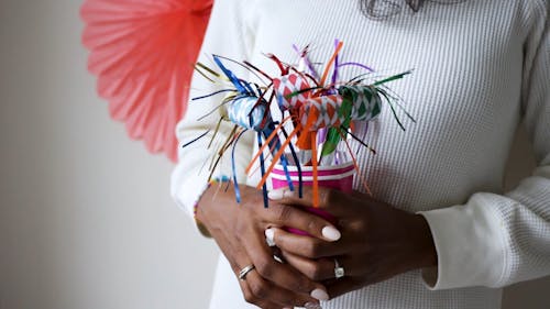 A Woman Holding Party Props