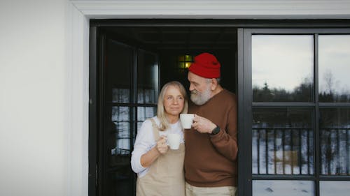 Couple Standing by the Door