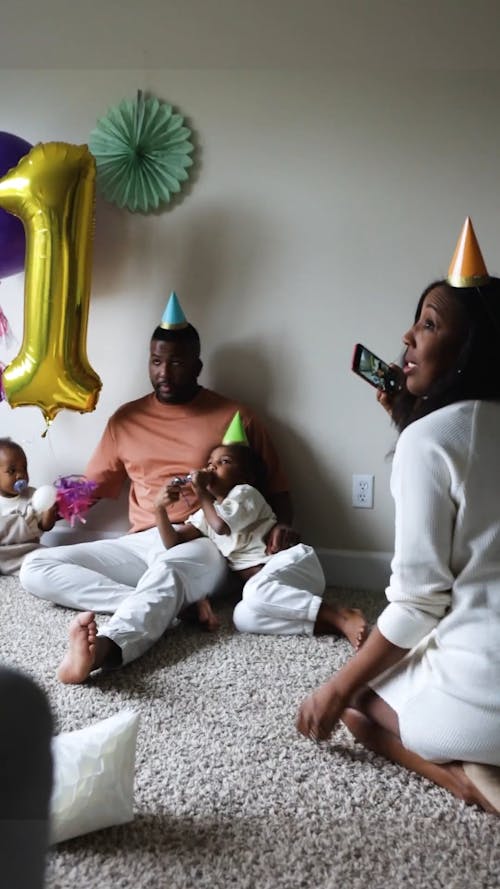 A Family Celebrating Their Baby's First Birthday