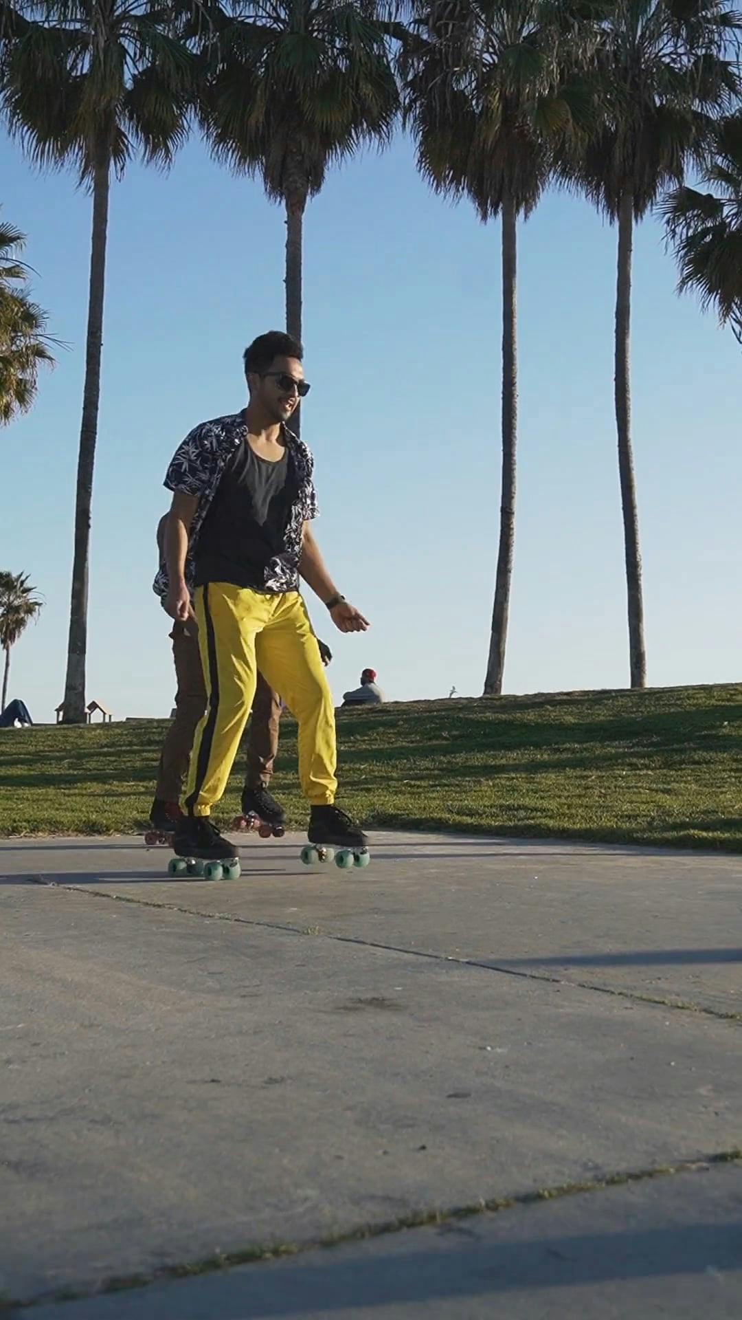 Man and Woman is Dancing while Wearing Roller Skates · Free Stock Video