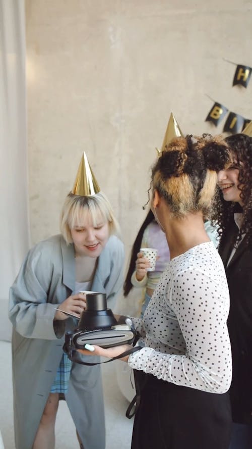 Group of People Wearing Party Hats