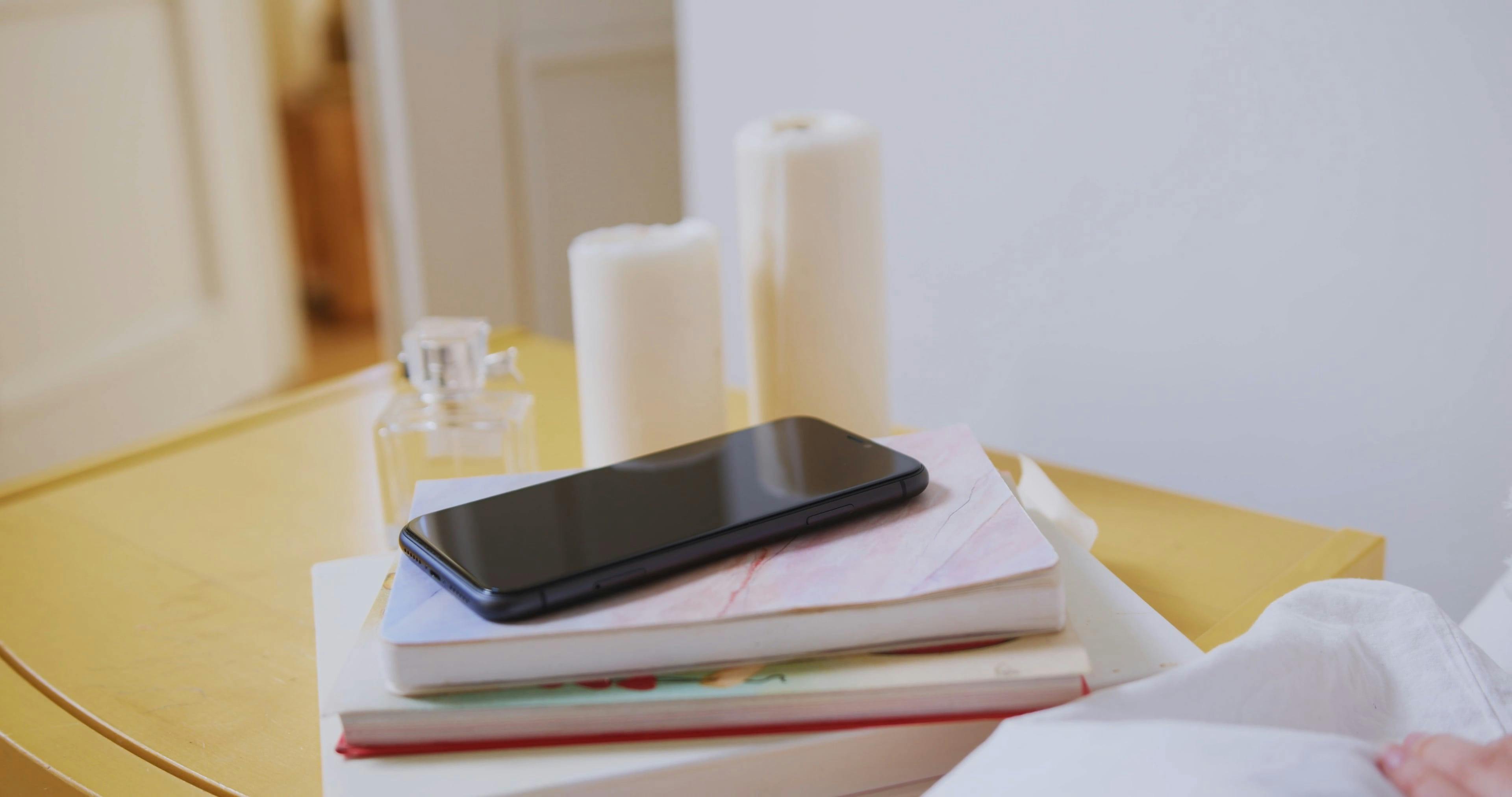 A Person Pressing Snooze on the Phone Alarm Clock Free Stock Video