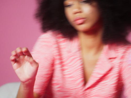 A Girl Answering A Telephone Call