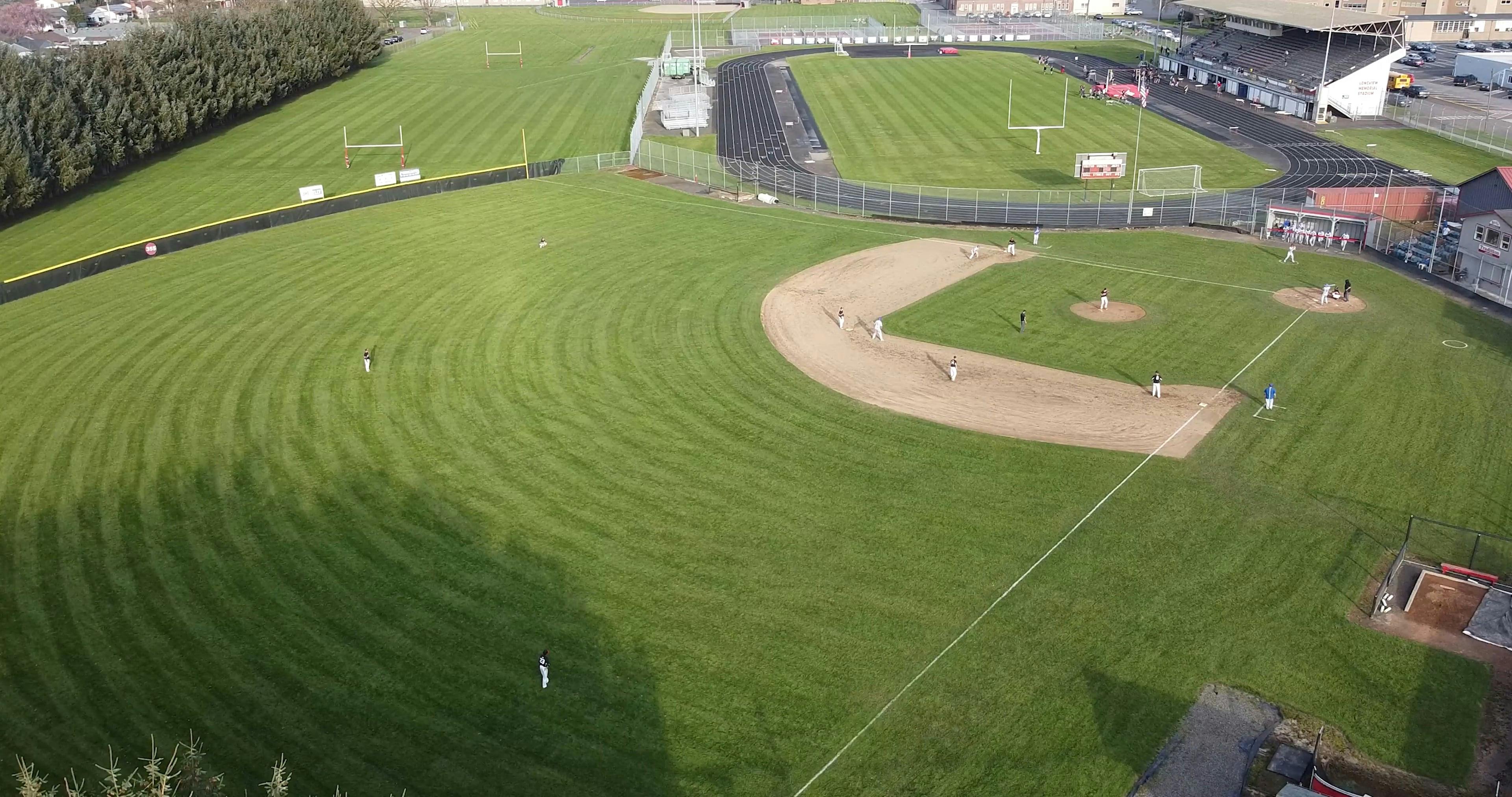 Aerial Footage of People Playing Baseball on Baseball Field · Free Stock Video