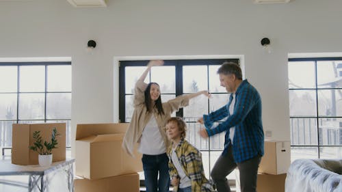 Family Dancing in a New Home 