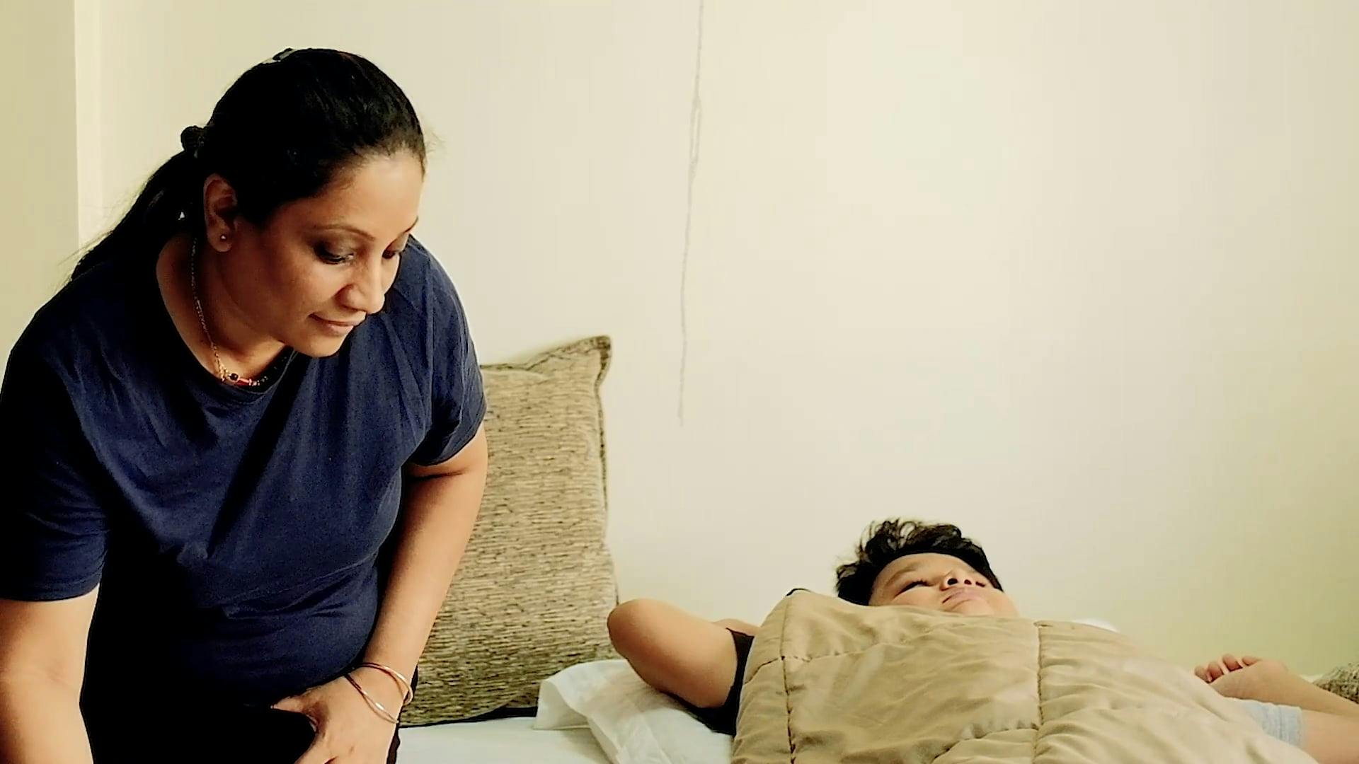 Mother Waking Up her Son · Free Stock Video
