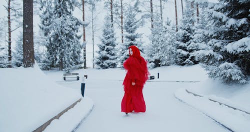 A Woman Wearing Red Clothes