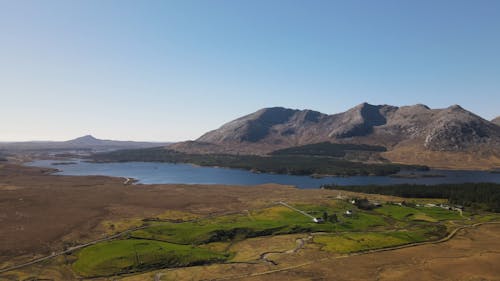 An Aerial Footage of a Lake and Mountains