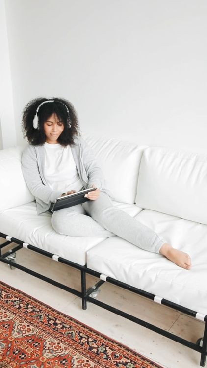 Woman On A Sofa Using a Tablet Free Stock Video Footage, Royalty-Free ...