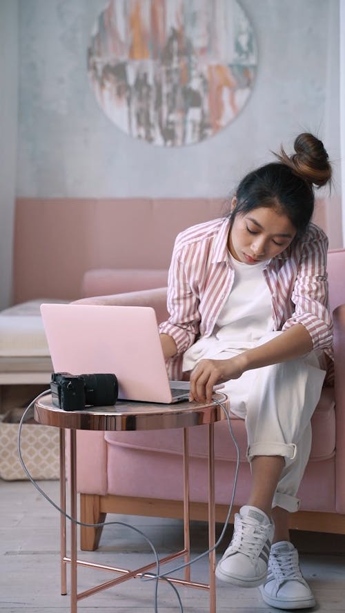 Woman Charging her Laptop
