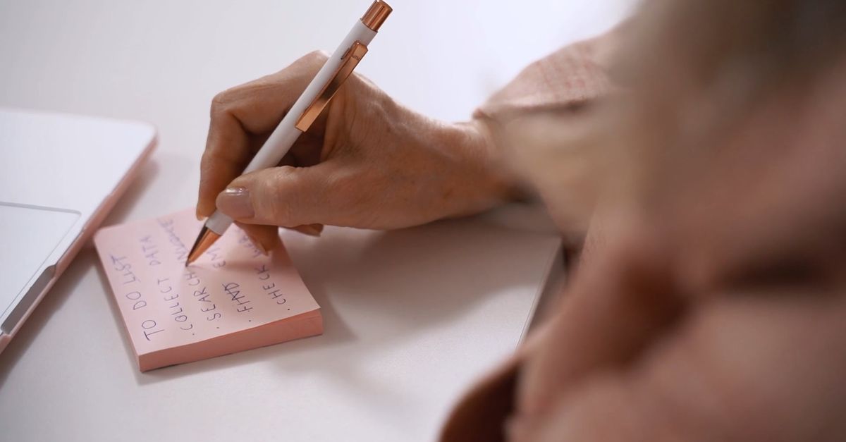 Close Up Video of a Person Writing on Sticky Notes Free Stock Video ...