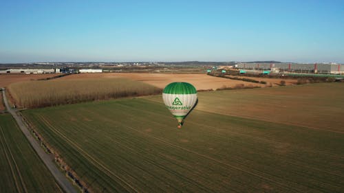 Drone Footage of Hot Air Balloon on a Field