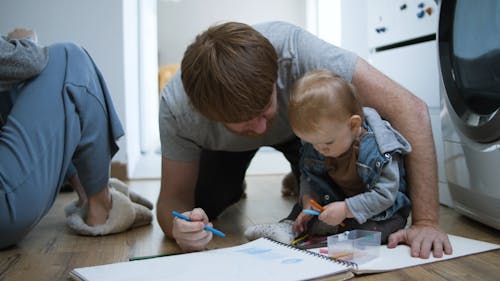 Parents Coloring with a Child