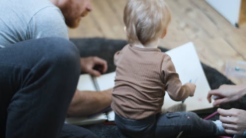 Father Coloring with a Child