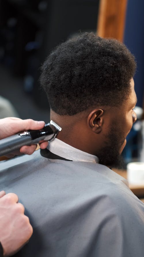 Close-up Shot of a Man Getting a Haircut · Free Stock Video