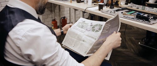 A Man Reading the Newspaper