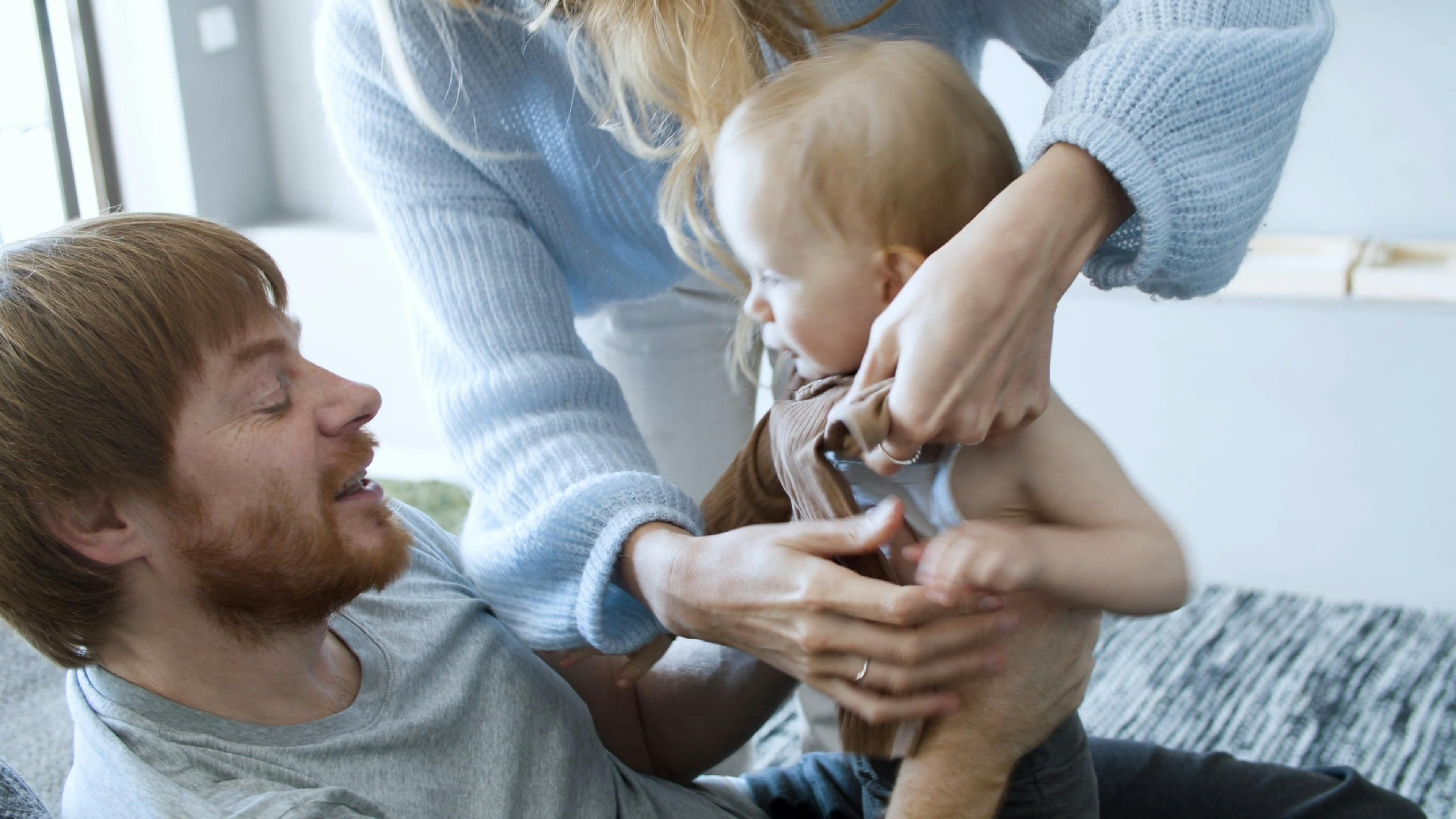 Father Holding Cute Baby Girl Changing Clothes Free Stock Video Footage,  Royalty-Free 4K & HD Video Clip