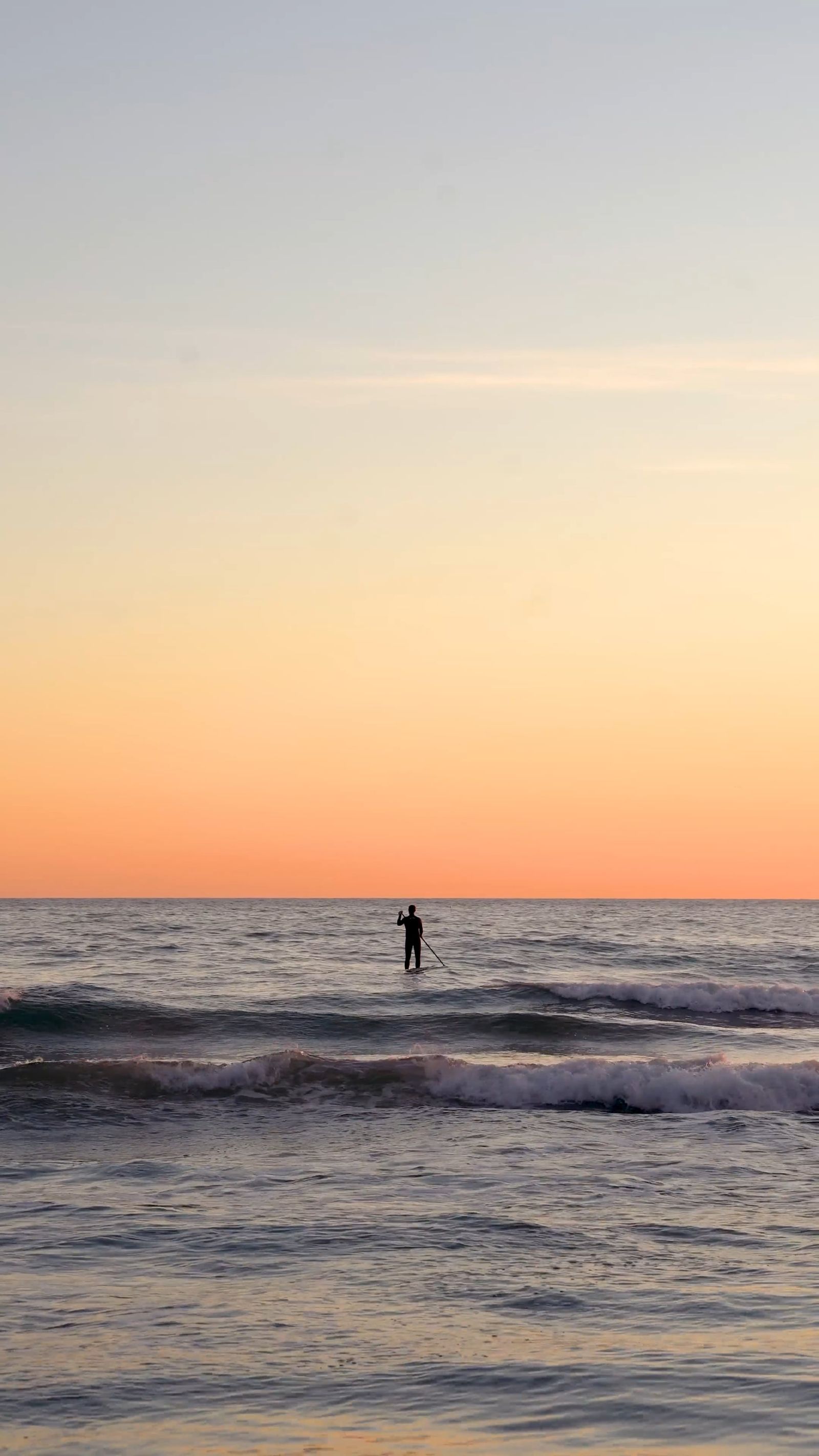 Two people are standing on the beach at sunset Free Stock Video Footage ...