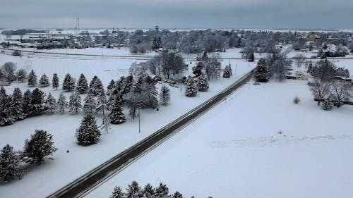 A Drone Footage of a Snow Covered Landscape