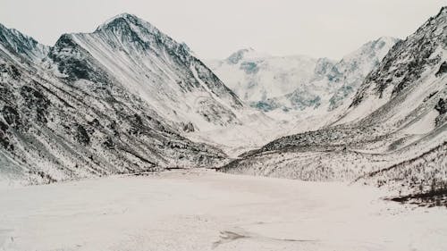 Aerial Footage of Mountains Covered with Snow