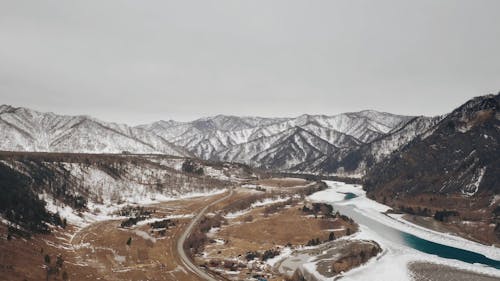 Snow Covered Mountains and River