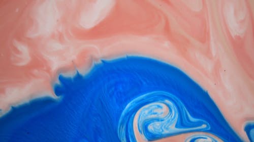 Pink and Blue Liquid Paint in Motion