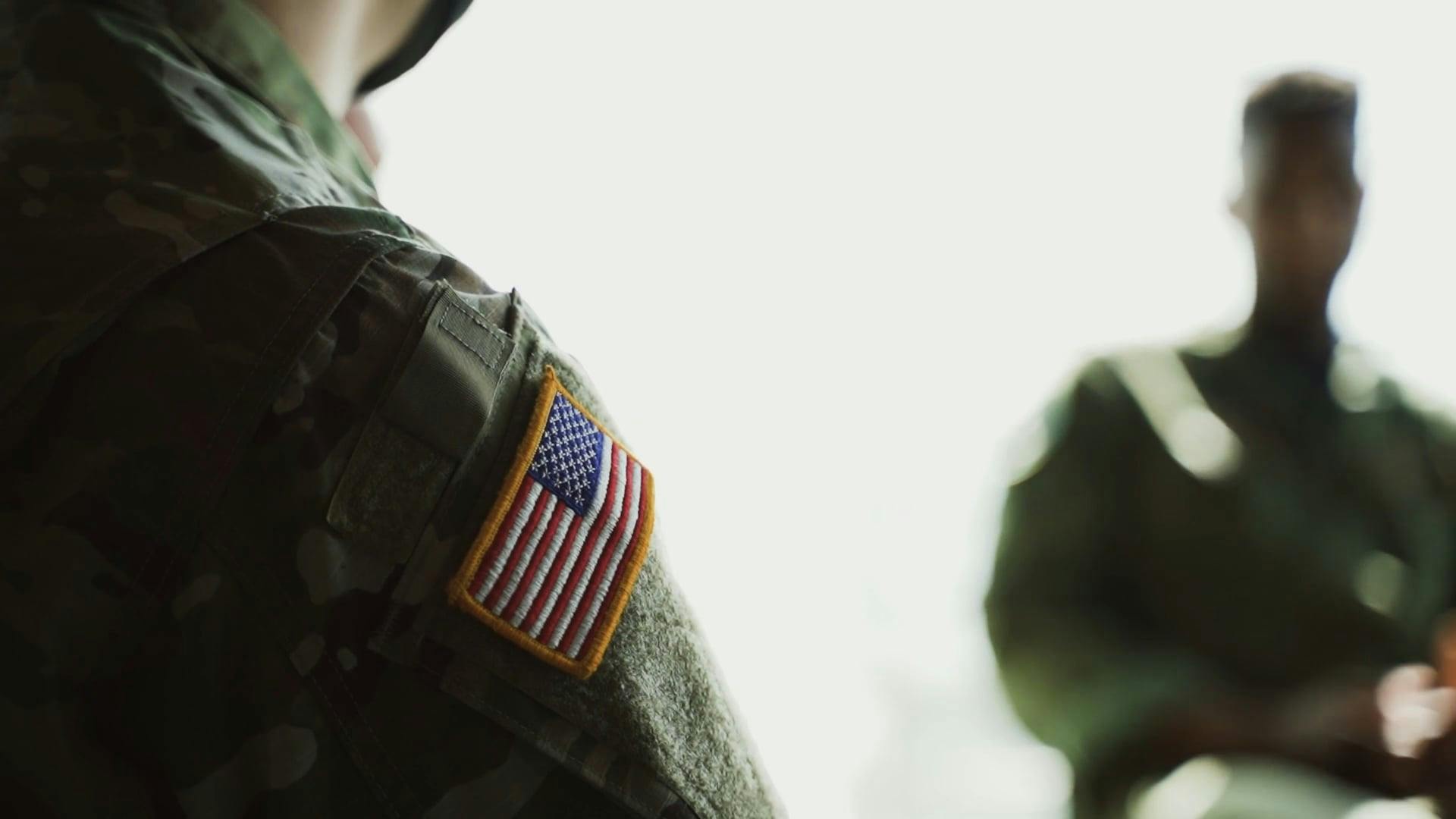 A Military Personnel with a American Flag Patch · Free Stock Video