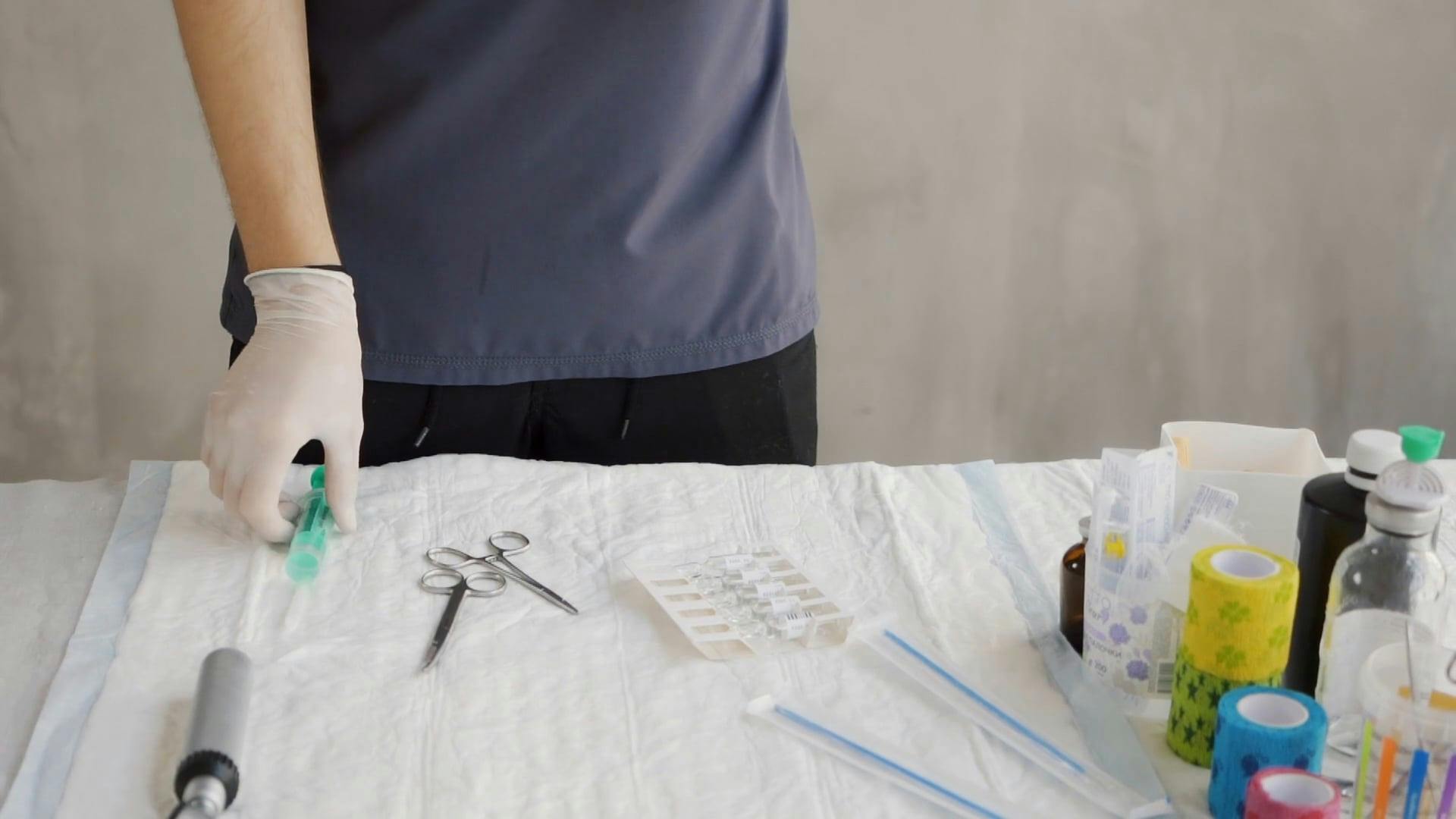 A Medical Professional Preparing Medical Equipment · Free Stock Video