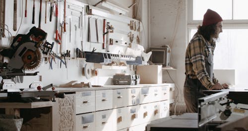 A Carpenter Writing in the Counter