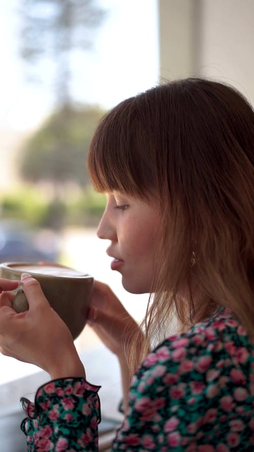 Close-Up Video of Woman Sipping Coffee 