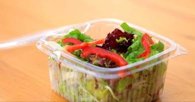 close up of vegetables in a plastic container
