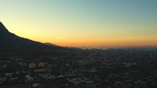Aerial View Of Cityscape At Sunset