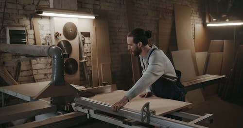 A Man Working at a Carpentry Workshop