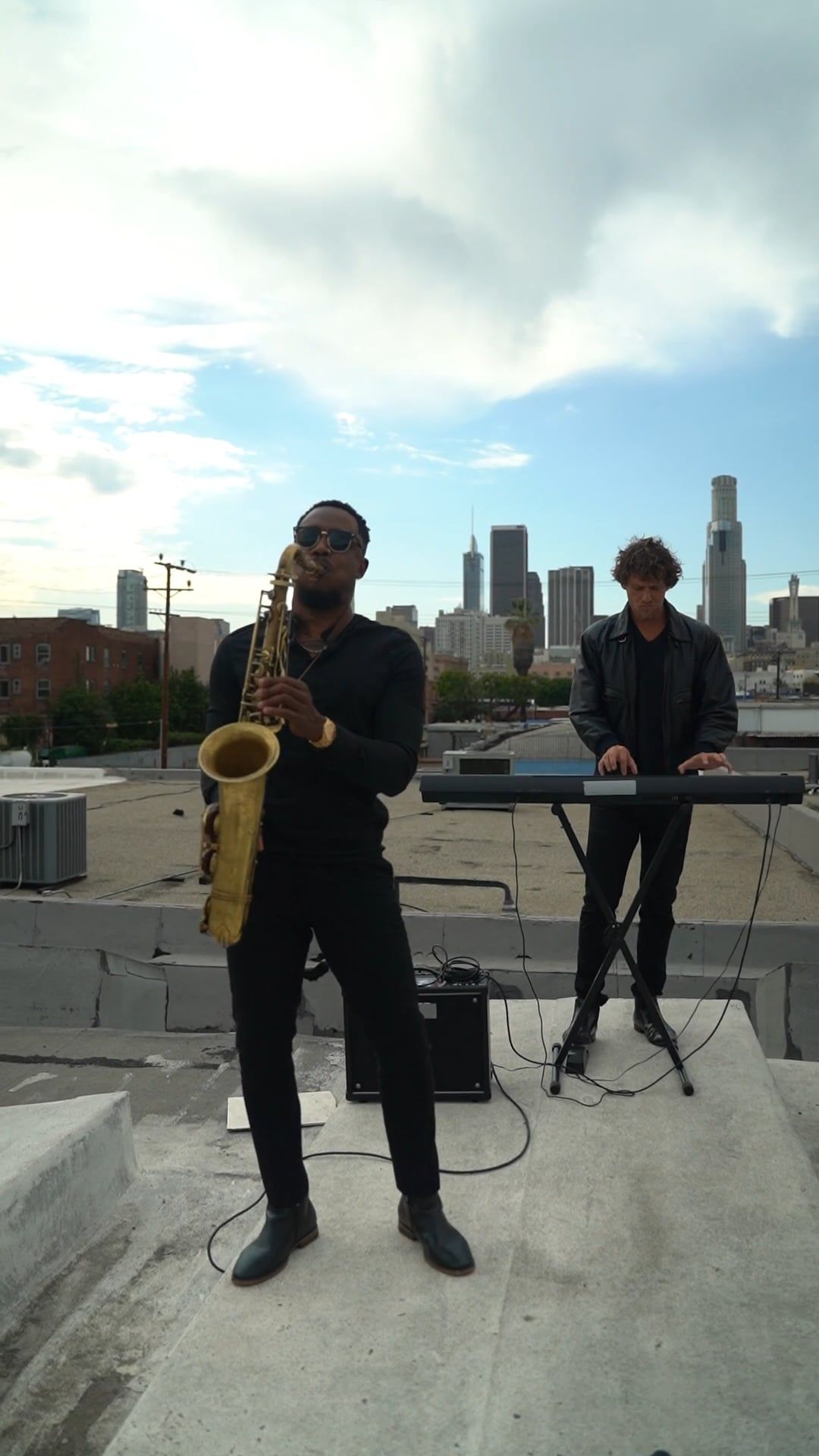 A Man Playing the Saxophone on a Rooftop Free Stock Video Footage ...
