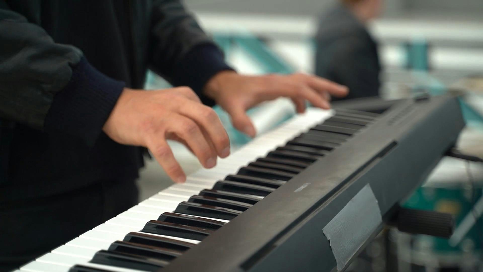 CloseUp Video of a Person Playing an Electronic Keyboard · Free Stock