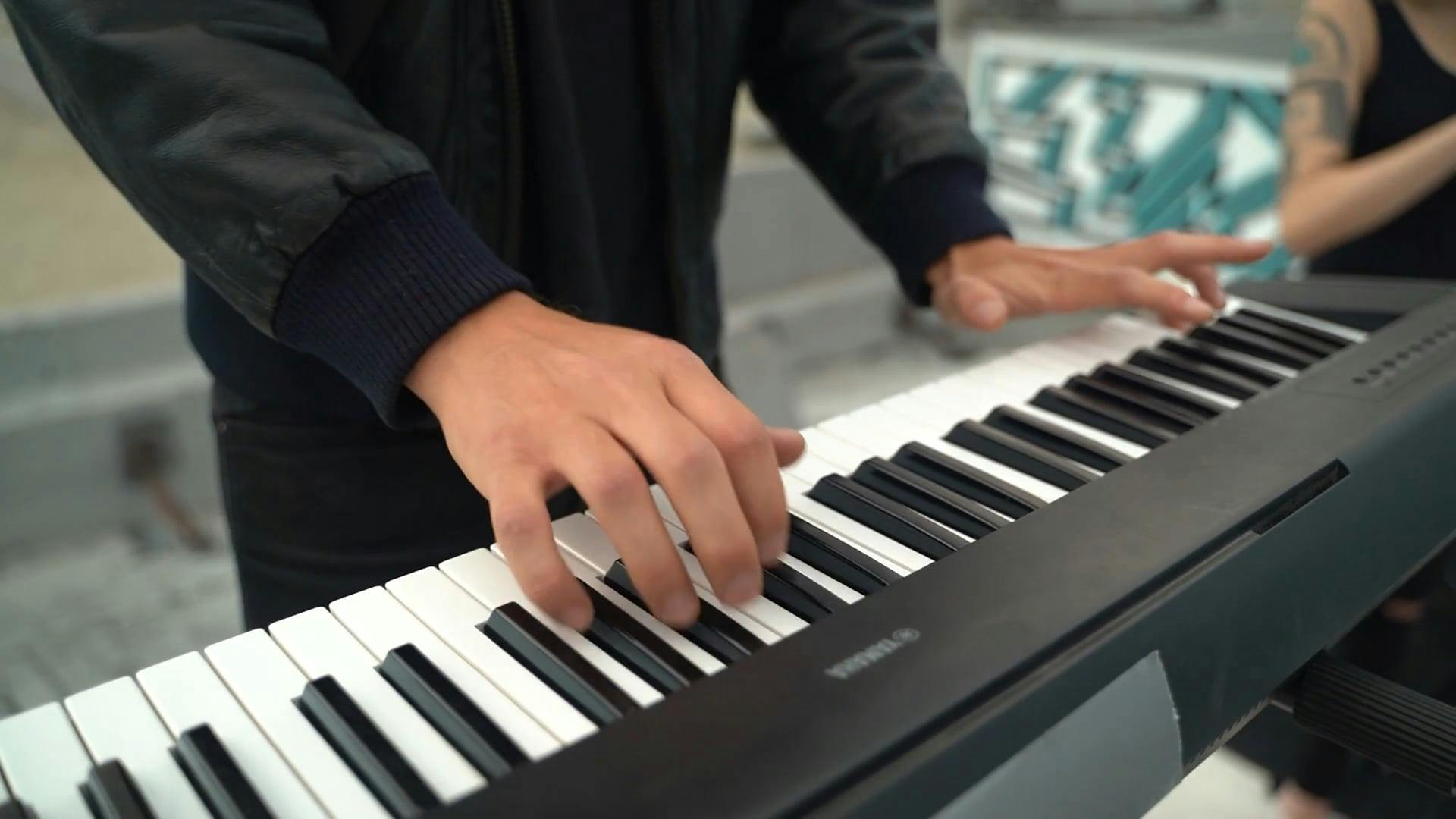 CloseUp Video of a Person Playing an Electronic Keyboard · Free Stock