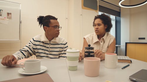 Group of People Having Coffee and Sharing Ideas 